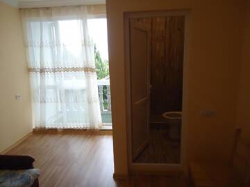 Фото номера Двухместный номер с 1 кроватью и балконом Гостевой дом Gios Guest House г. Чакви 3