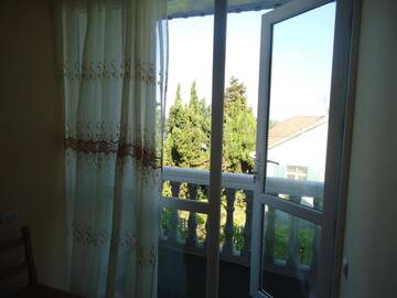 Фото номера Двухместный номер с 1 кроватью и балконом Гостевой дом Gios Guest House г. Чакви 9